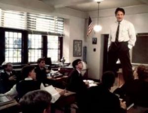 Robin Williams standing on a chair